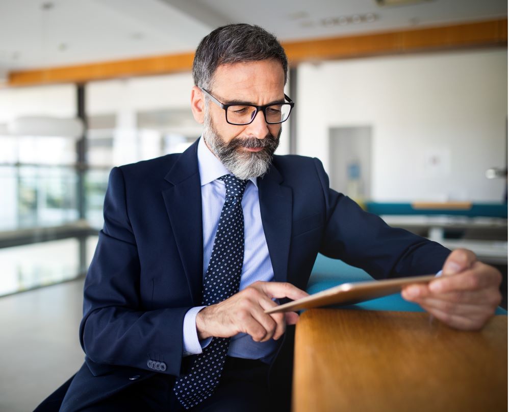 Man looking at the tablet