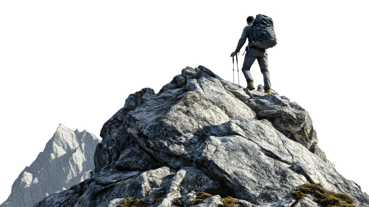 Person at a peak of a mountain